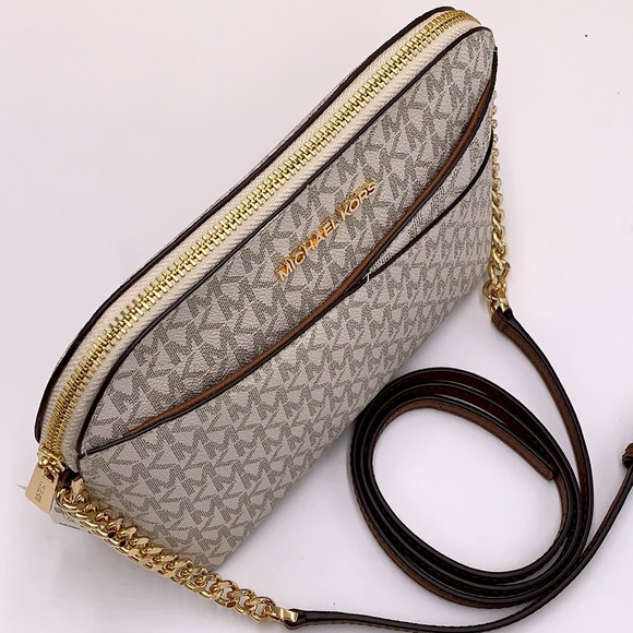 Michael Kors Medium Dome Xcross Xbody Bag
Color: Vanilla Multi - Picture 9 of 16